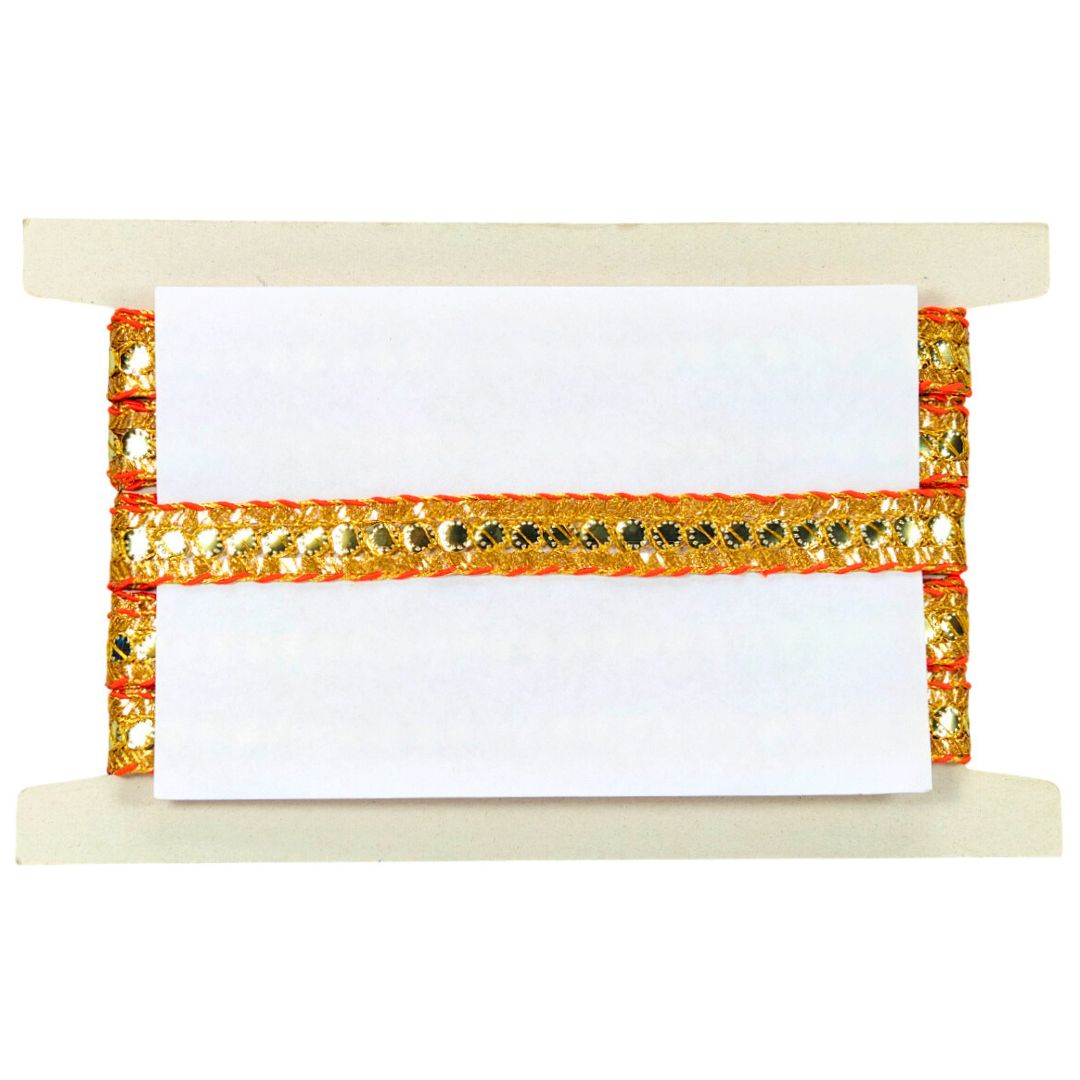 Decorative holder with a white card and gold embellishments on a white background