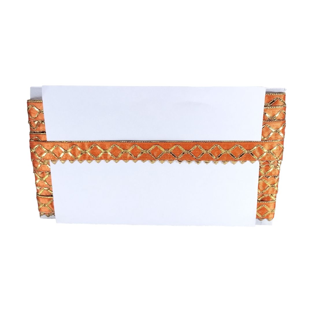 Decorative headboard with orange and gold lattice design on a white background