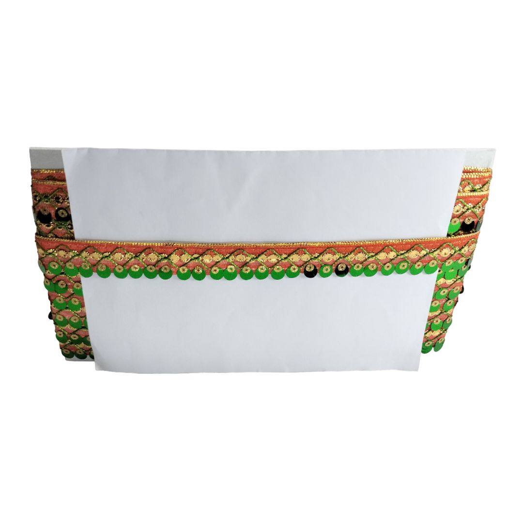Decorative white pouch with green and gold border on a white background