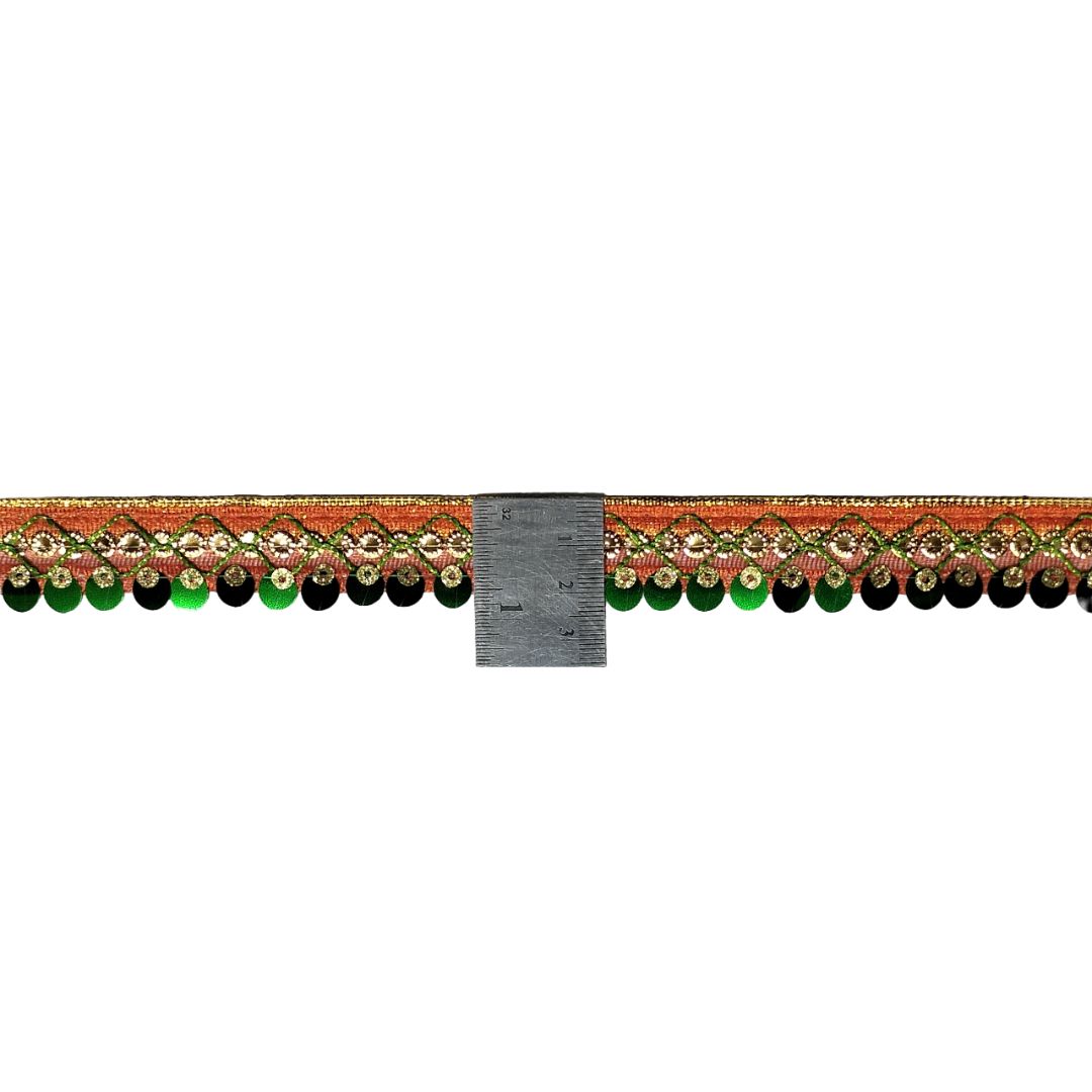Decorative border with green and black beads and gold accents on a white background.
