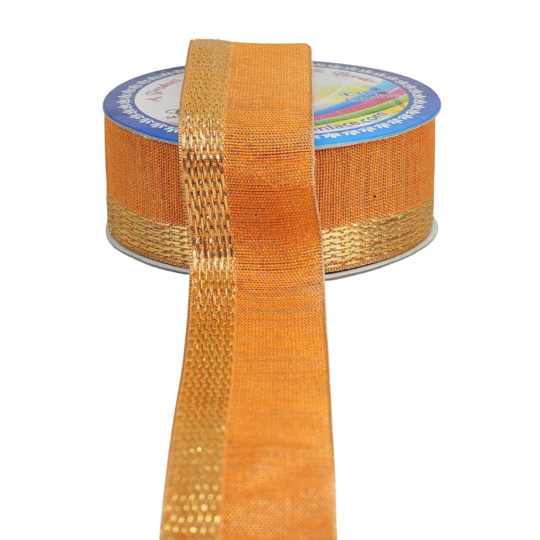 Orange mesh ribbon on a spool with a white background