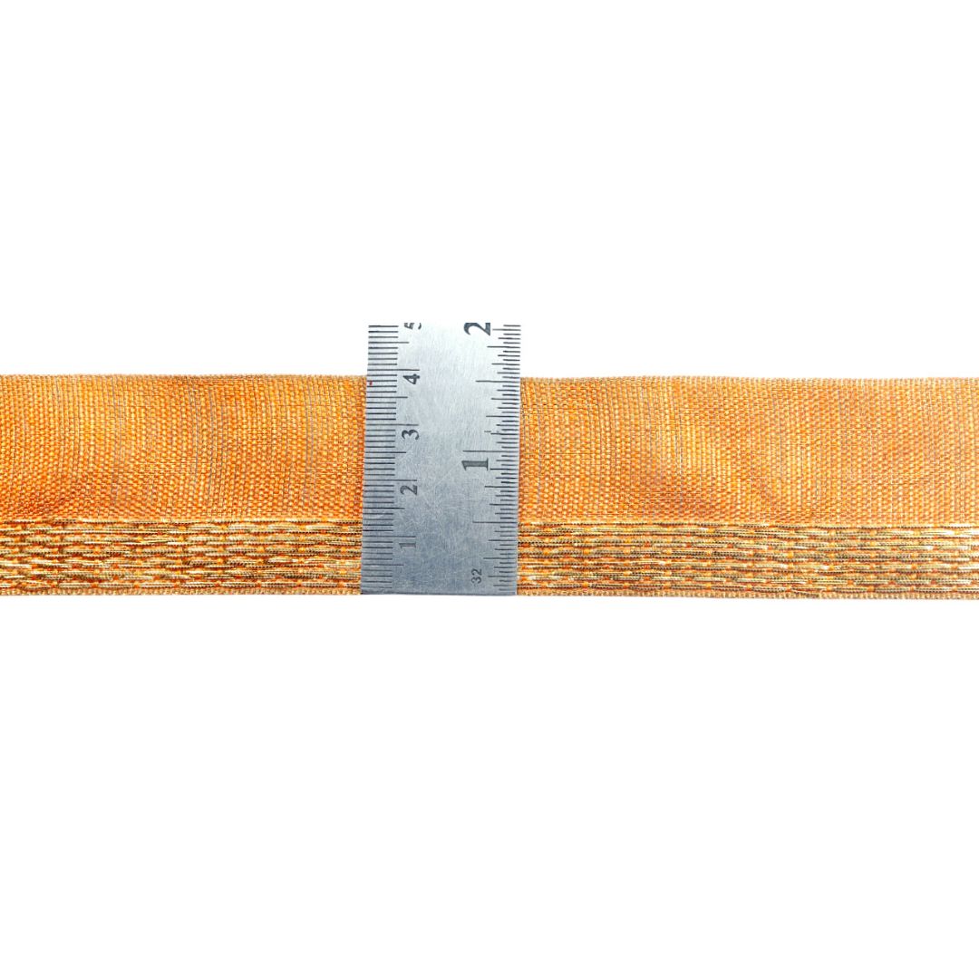 Orange webbing strap with a metal ruler for measurement on a white background