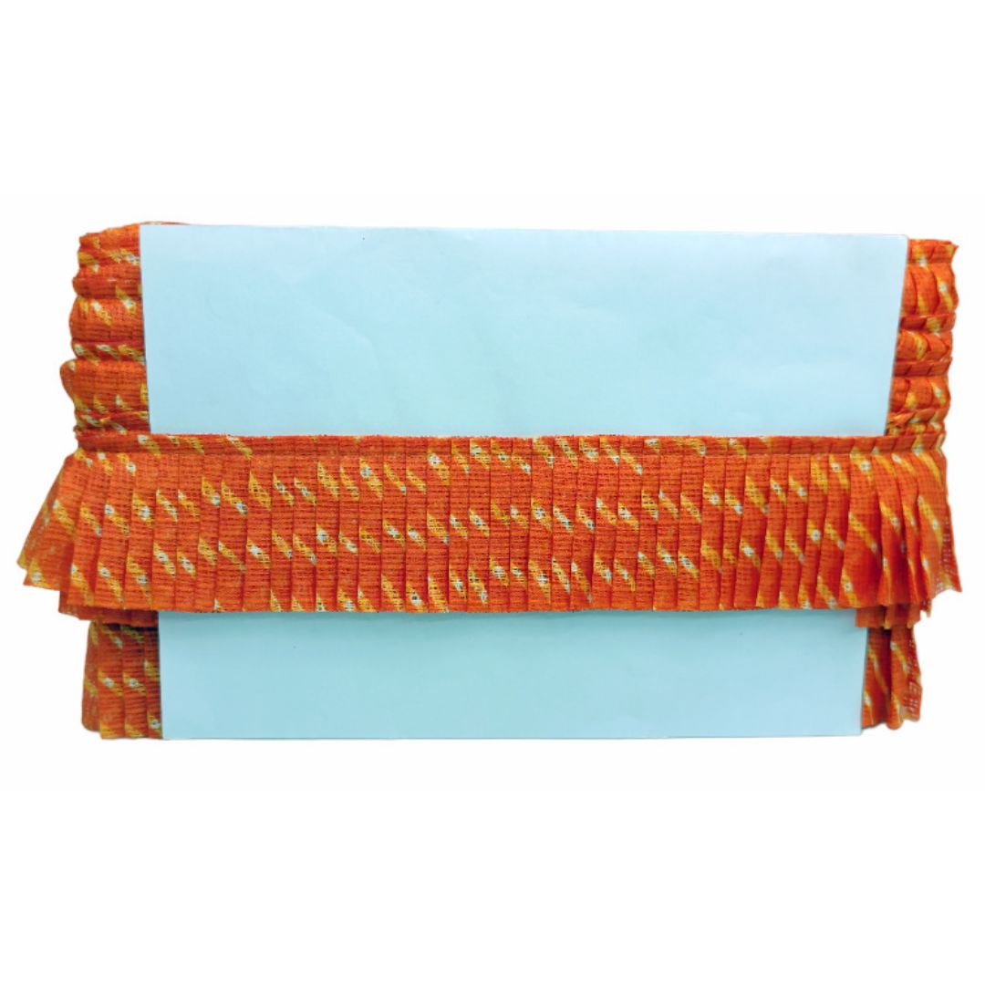Blue fabric with orange woven pattern on a white background