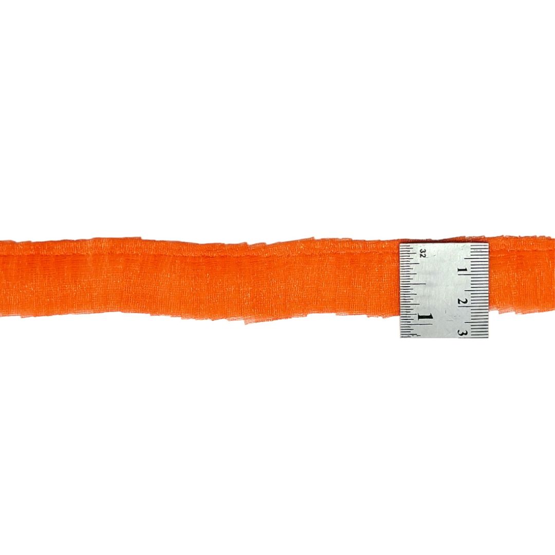 Orange belt with a metal measuring tape on a white background