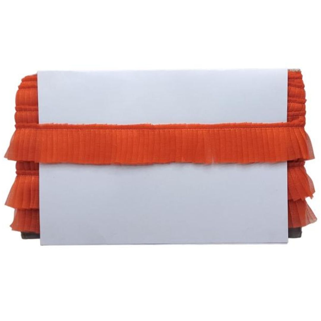 Orange pleated clutch bag on a white background