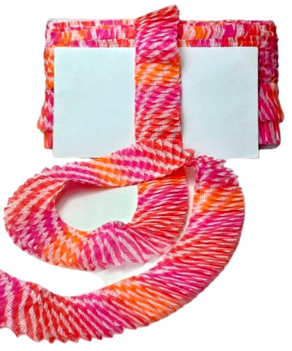 Colorful tie-dye scrunchie with a white background