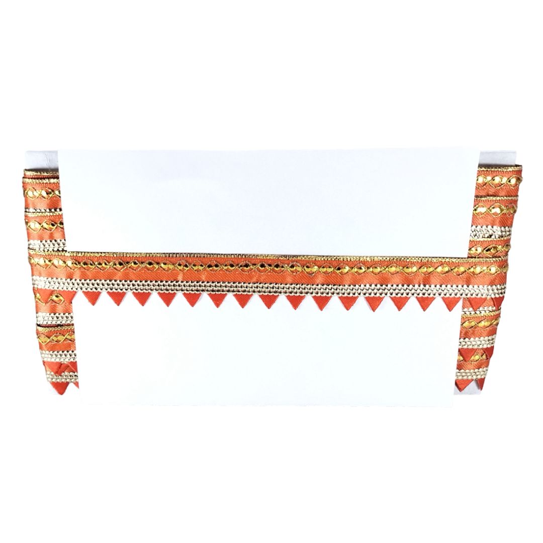 Decorative table runner with orange and white pattern on a white background