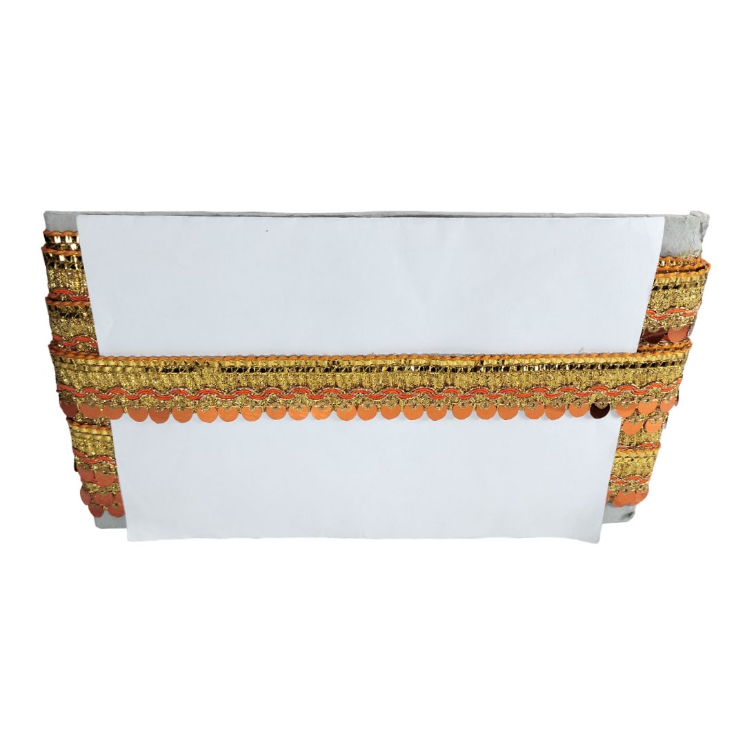 Decorative white box with gold and orange trim on a white background