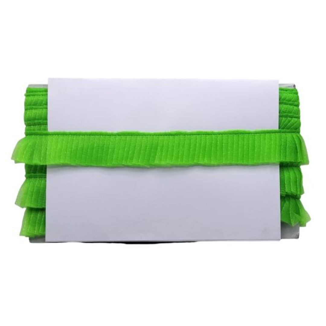 White card with green ribbons on a white background