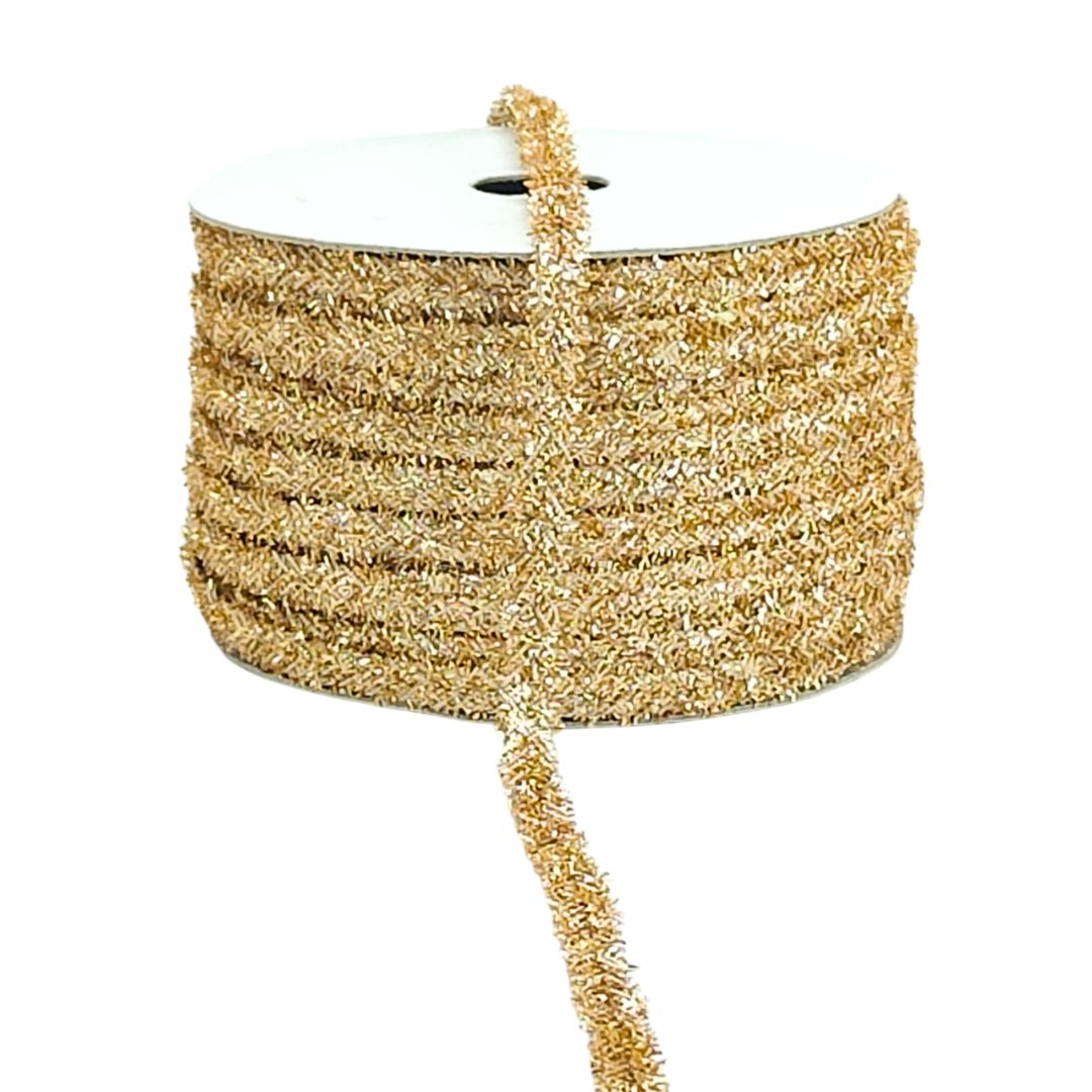 Gold glitter ribbon on a white background