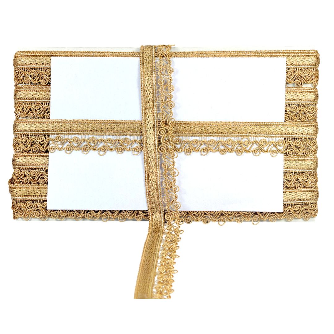 Two gold decorative frames with intricate patterns on a white background