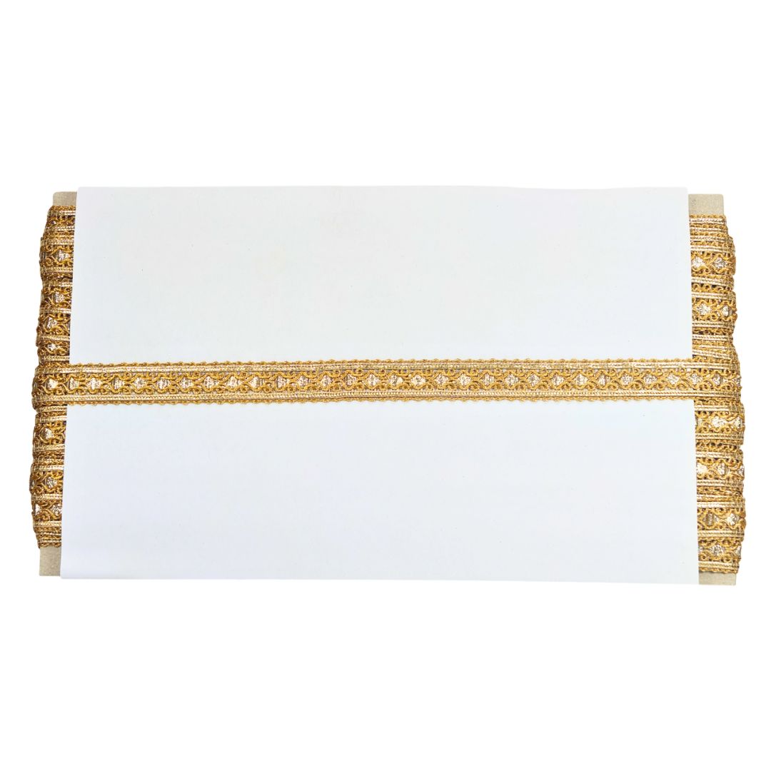 White clutch with gold decorative trim on a white background