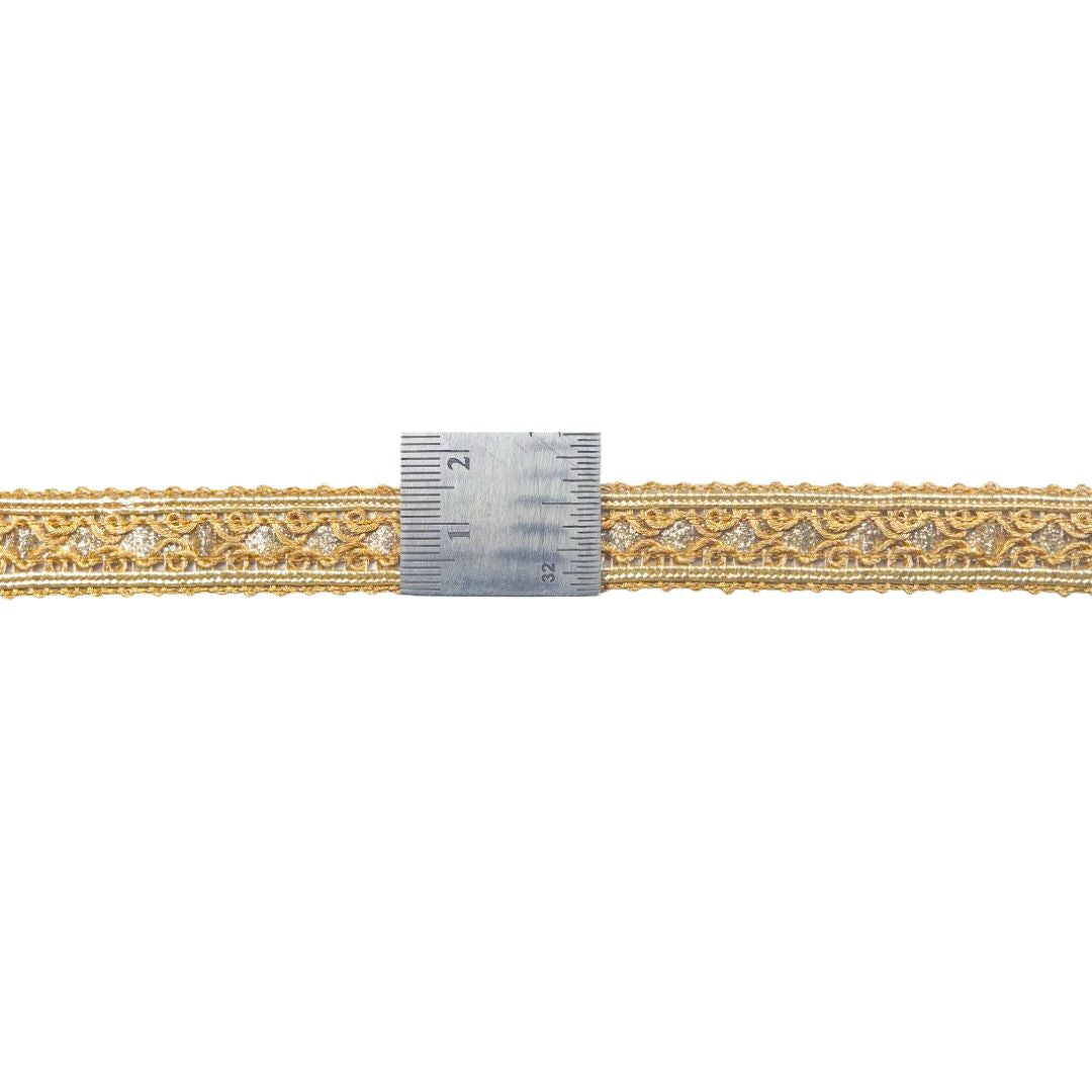 Gold decorative ribbon with a measuring tape on a white background