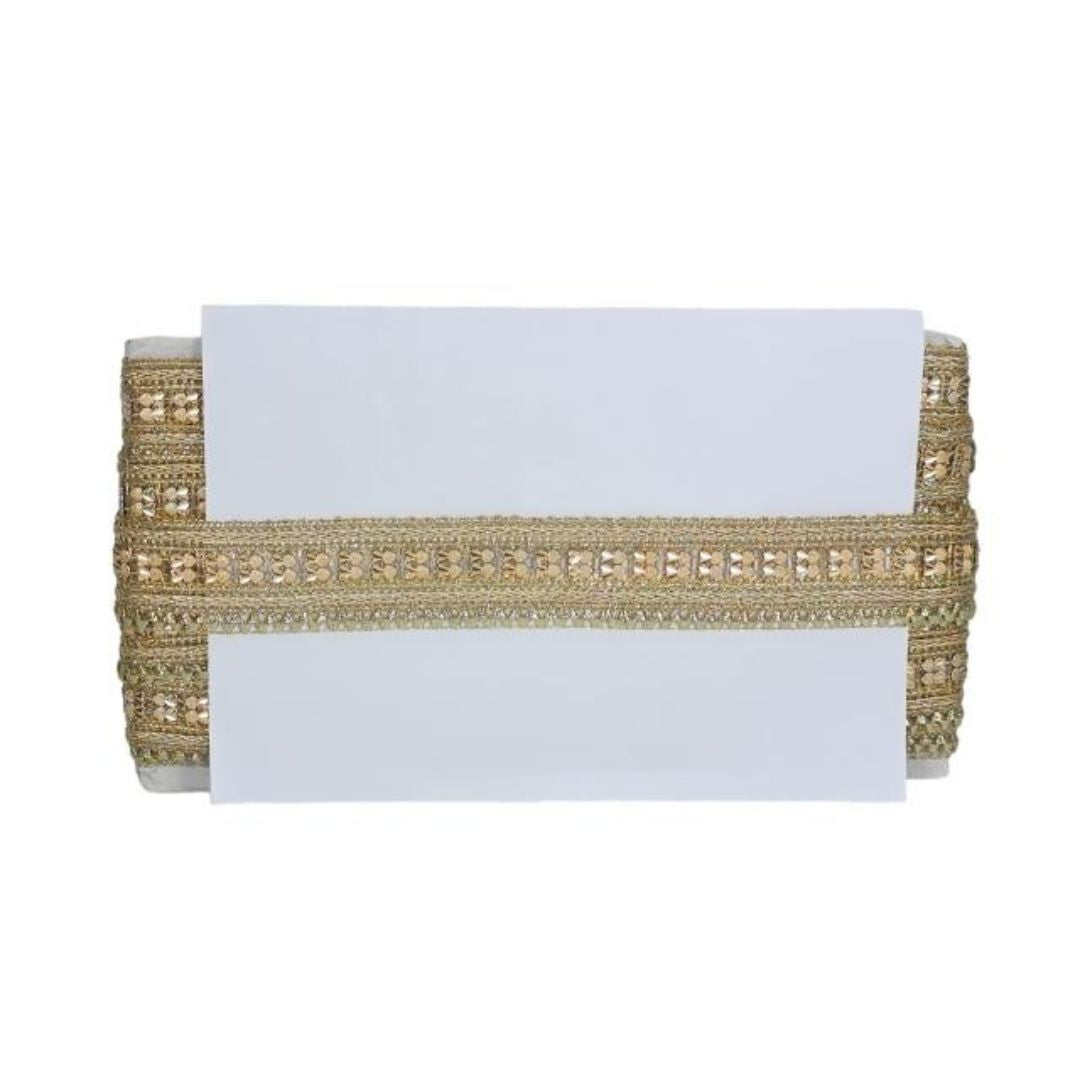 Gold clutch with a white card on a white background
