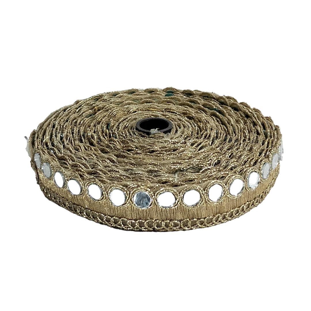 Roll of decorative ribbon with circular cutouts on a white background