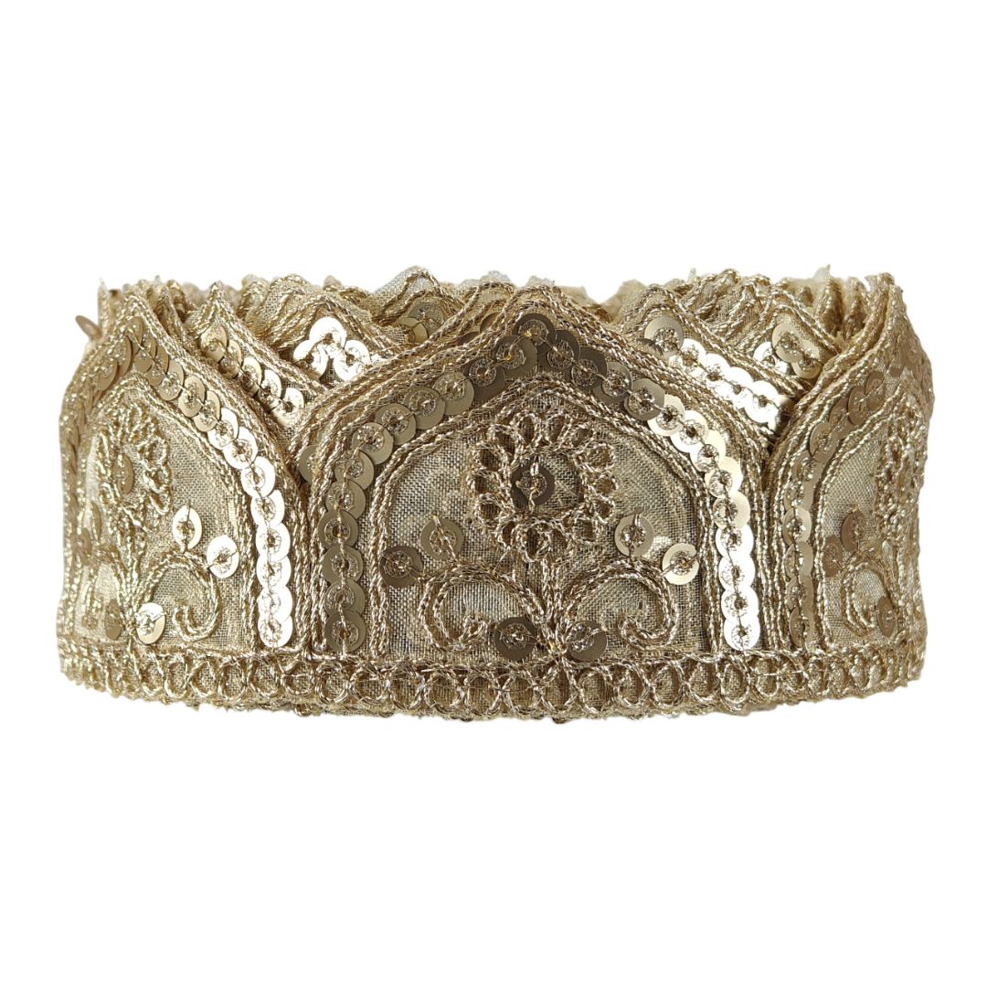 Decorative headband with lace and sequin details on a white background