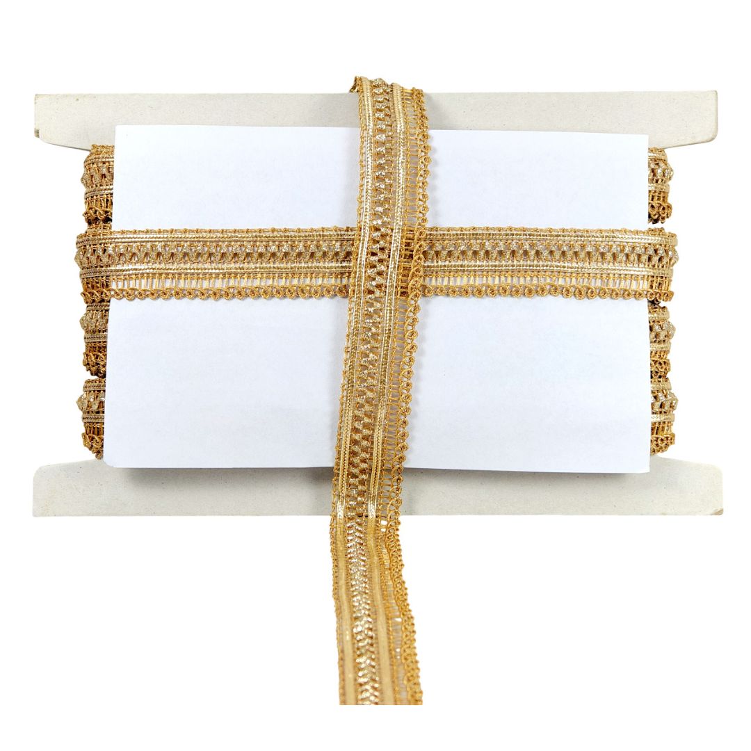 Gold decorative ribbon on a white card with a white background