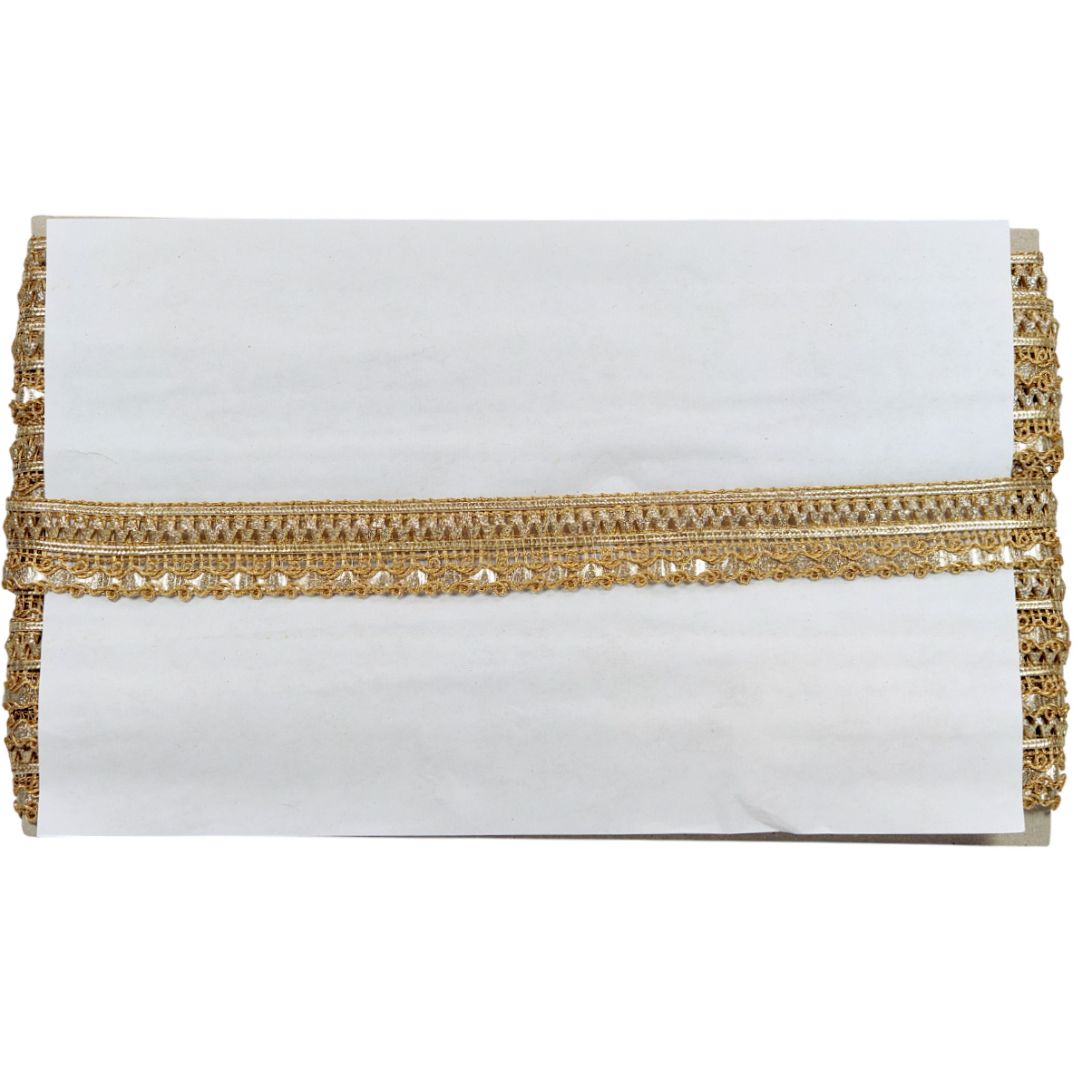 White clutch with gold trim on a white background