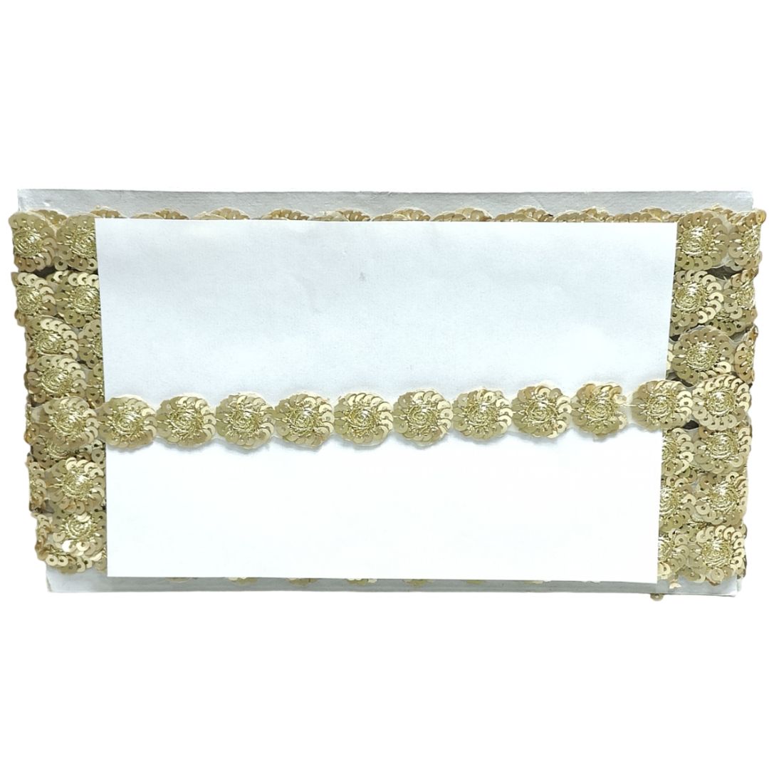 Decorative gold card holder with a white card inside on a white background