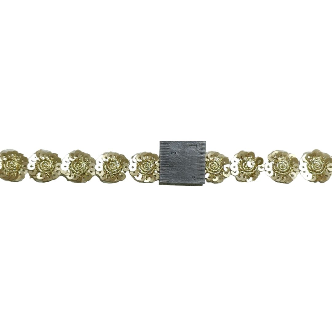 Gold chain with floral designs on a white background