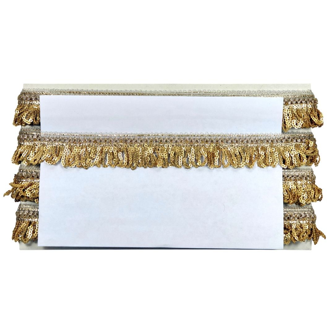 White card with gold fringe on a white background