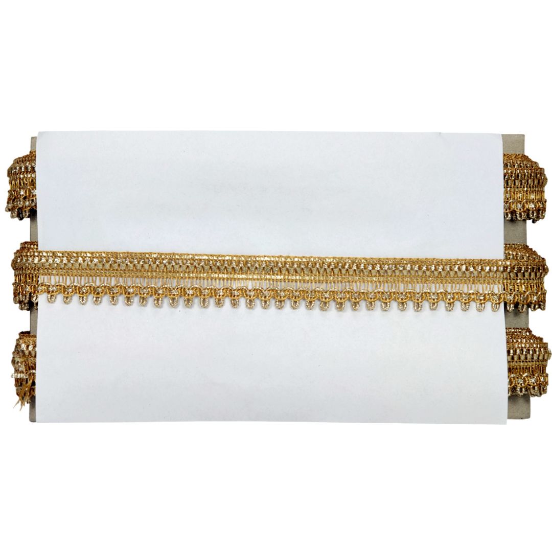White clutch with gold fringe on a white background