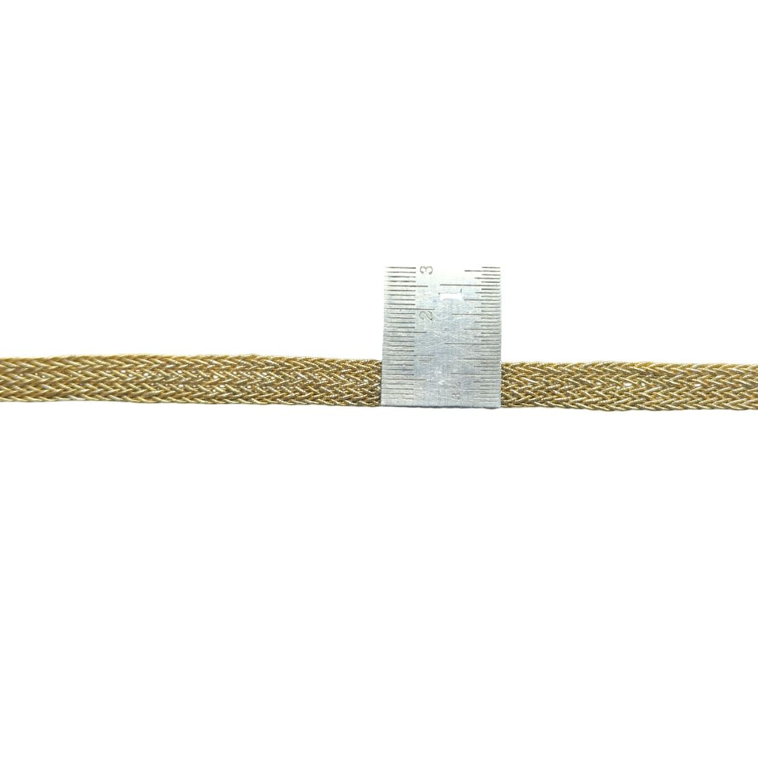 Gold braided cable with a silver connector on a white background