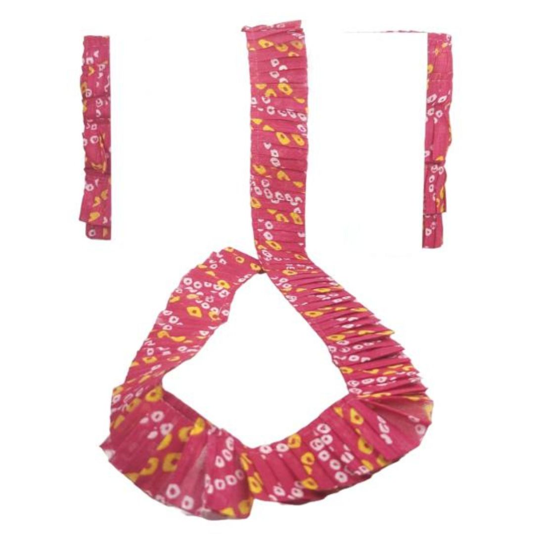 Pink floral-patterned headband and hair tie set on a white background
