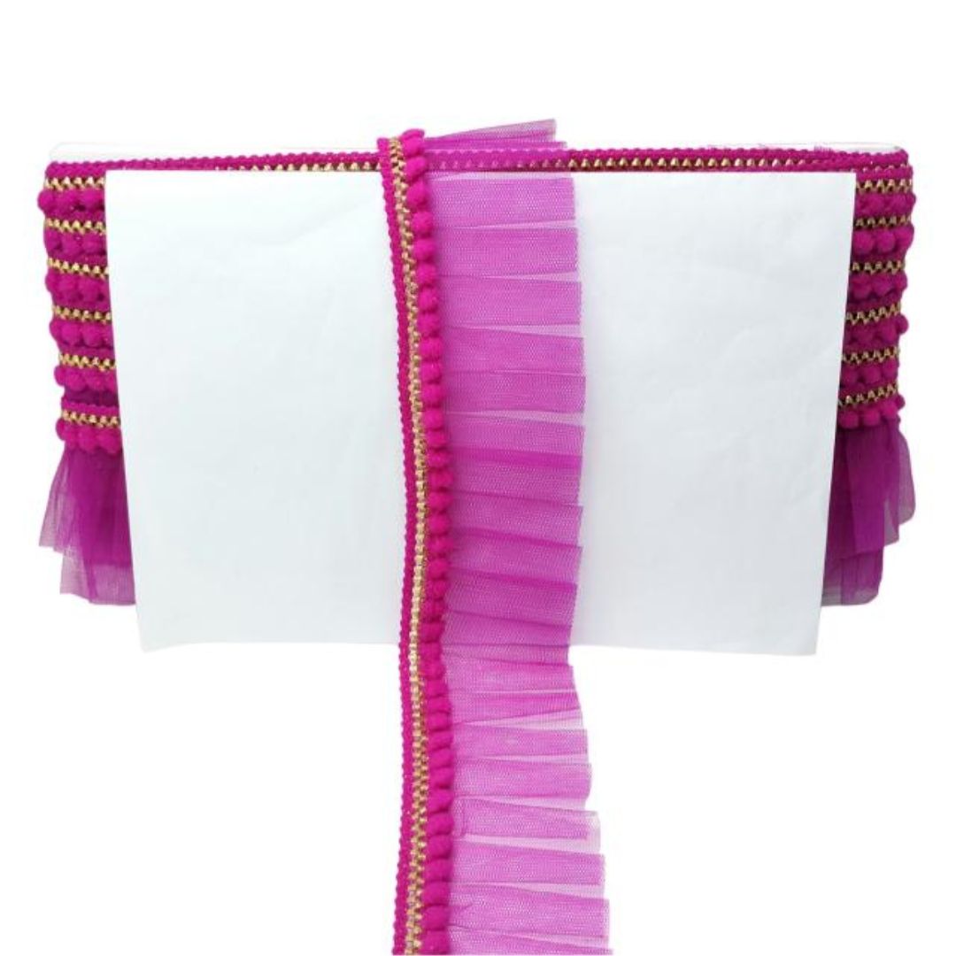 White fabric with pink ruffled edges on a white background