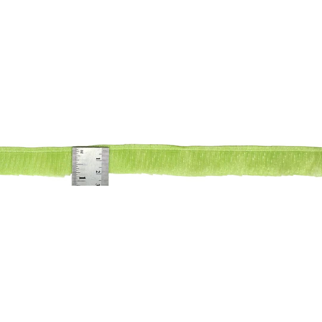 Green belt with a silver measuring tape on a white background