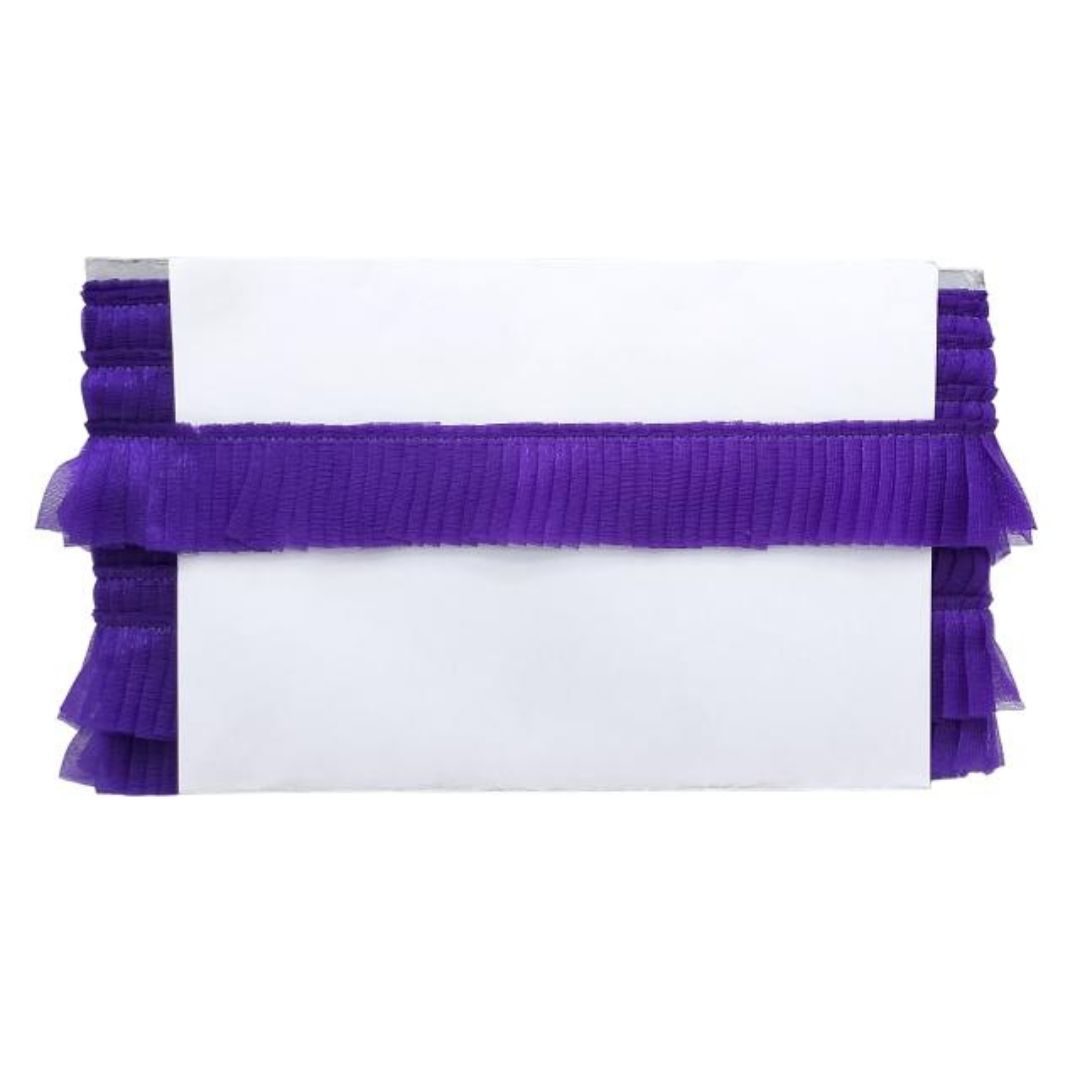 Purple ruffled trim on a white background