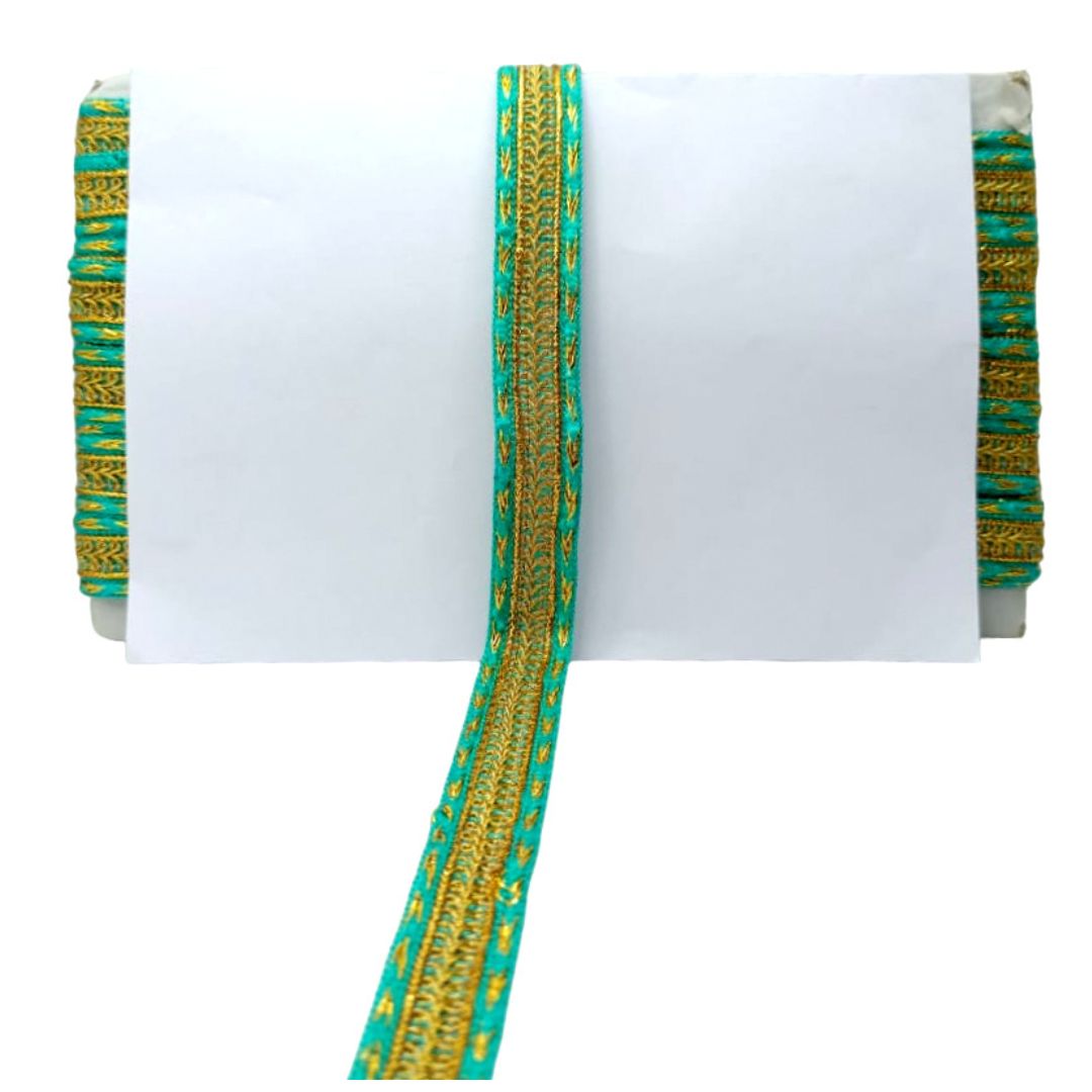 Pair of green and gold bangles on a white background