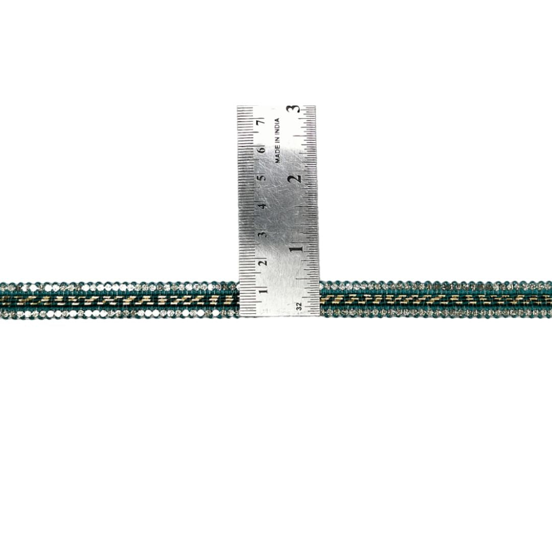 Metal ruler with a textured green and black strap on a white background