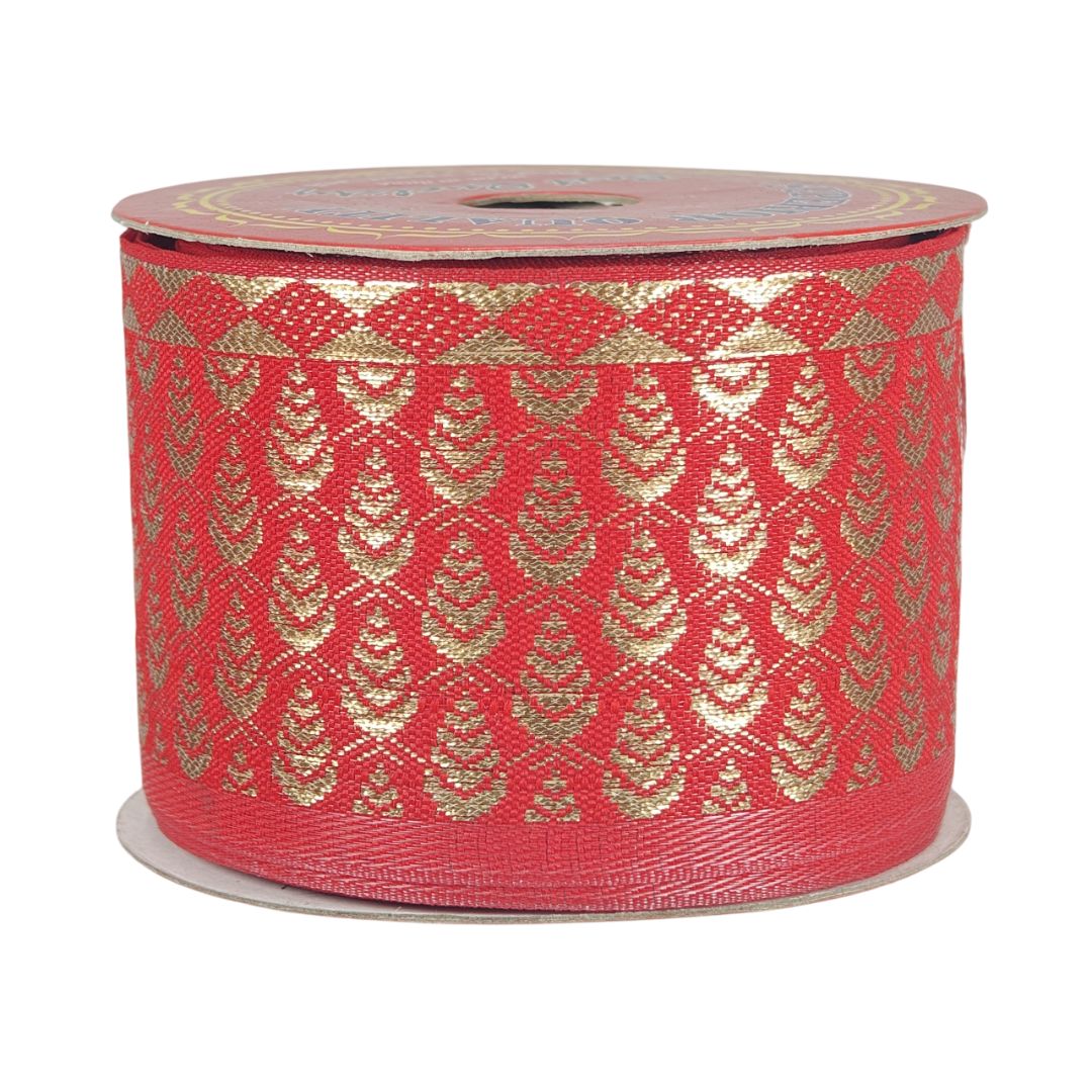 Red ribbon with gold pattern on a white background