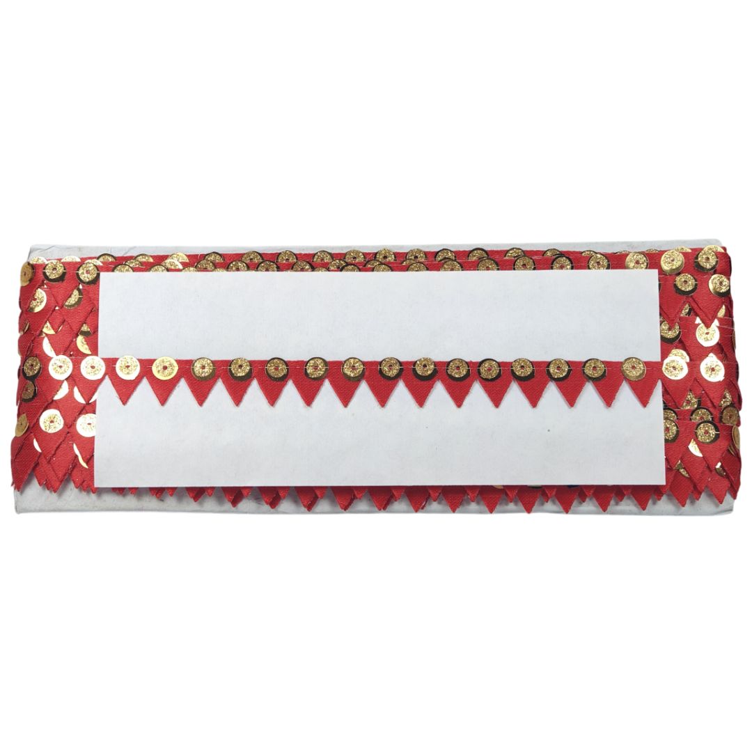 Decorative red and gold clutch bag with a white center on a white background