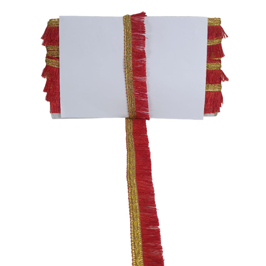 Decorative red and gold ribbon on a white background