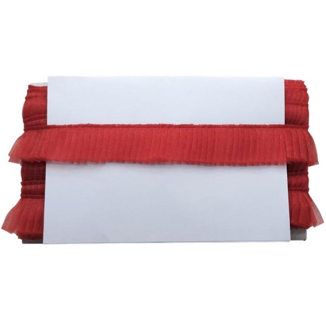 Red ruffled trim on a white background