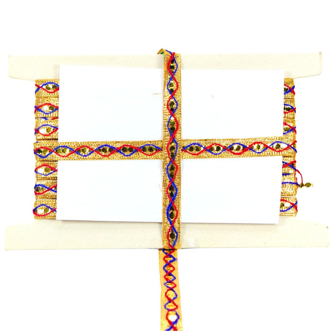 Decorative cross with colorful braided design on a white background