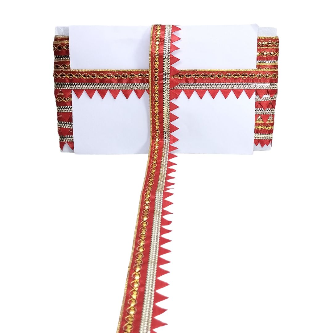 White garment with red and gold decorative border on a white background