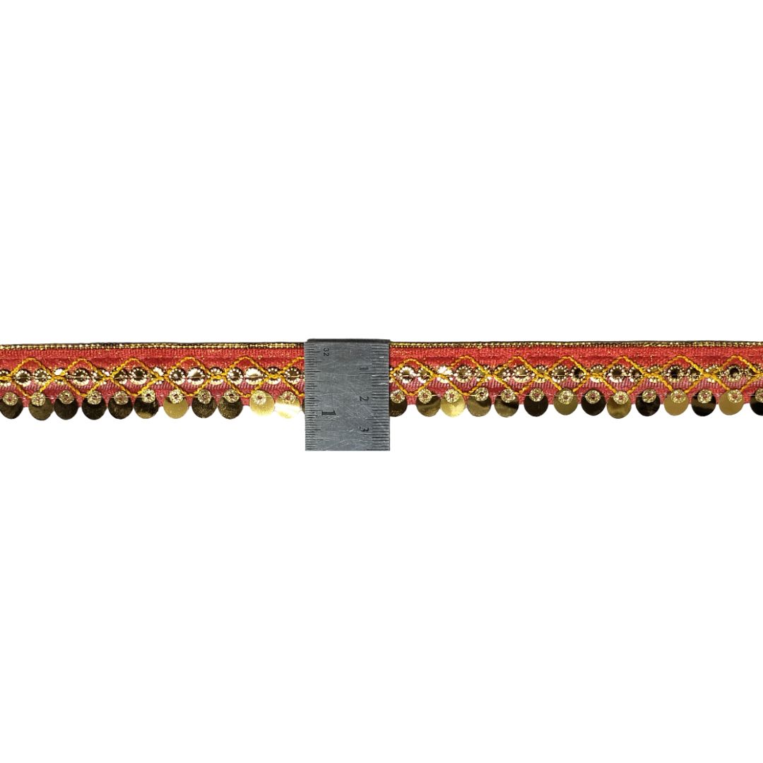 Decorative trim with gold and red pattern on a white background