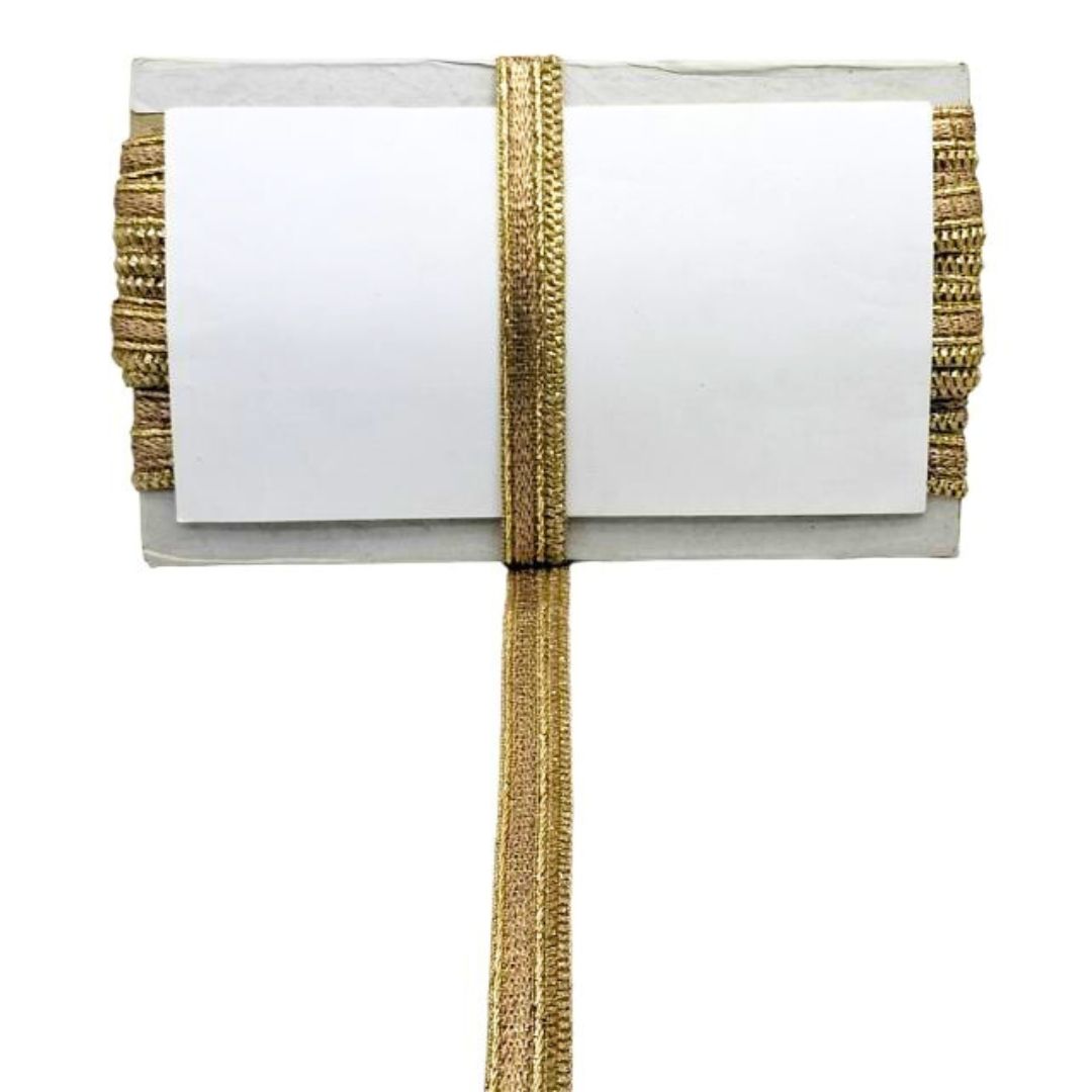 White clutch bag with gold ribbon on a white background