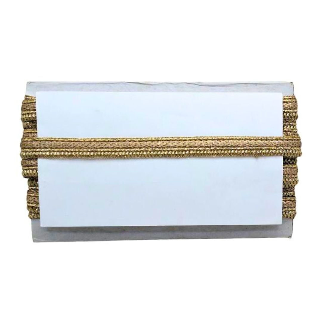 Clutch bag with gold and silver accents on a white background
