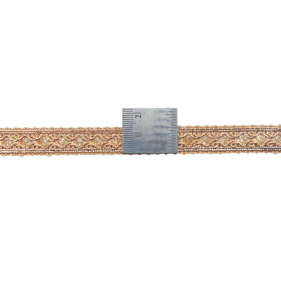 Decorative lace trim with a measuring ruler on a white background