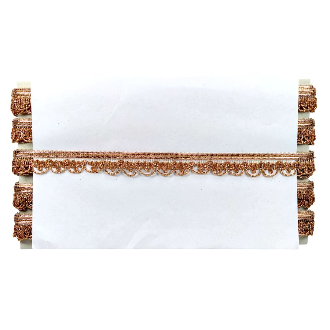 Decorative white pillow with gold trim on a white background