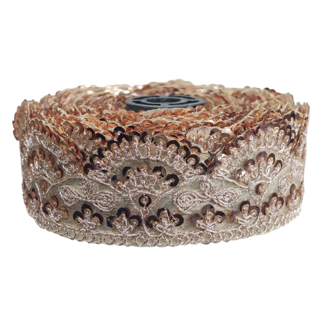 Decorative ribbon with intricate patterns on a white background