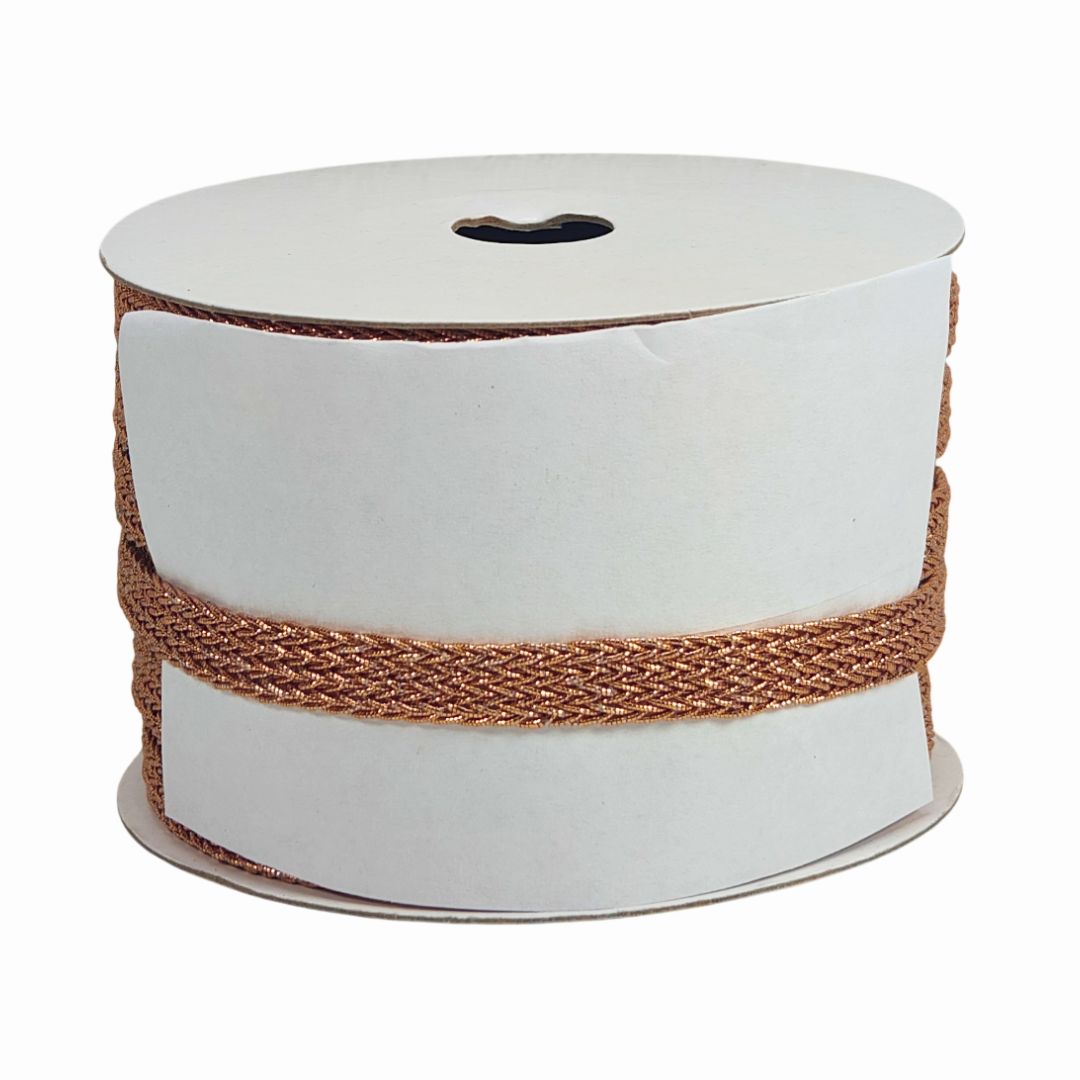 Spool of white ribbon with brown braid on a white background