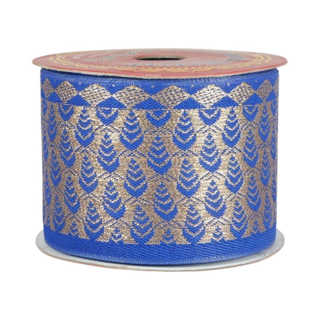 Spool of blue and gold patterned ribbon on a white background
