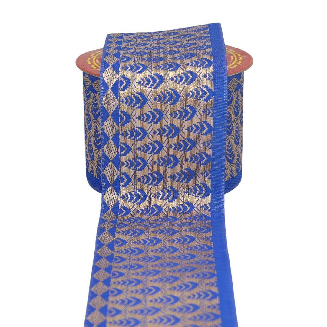 Blue and gold patterned fabric roll on a white background