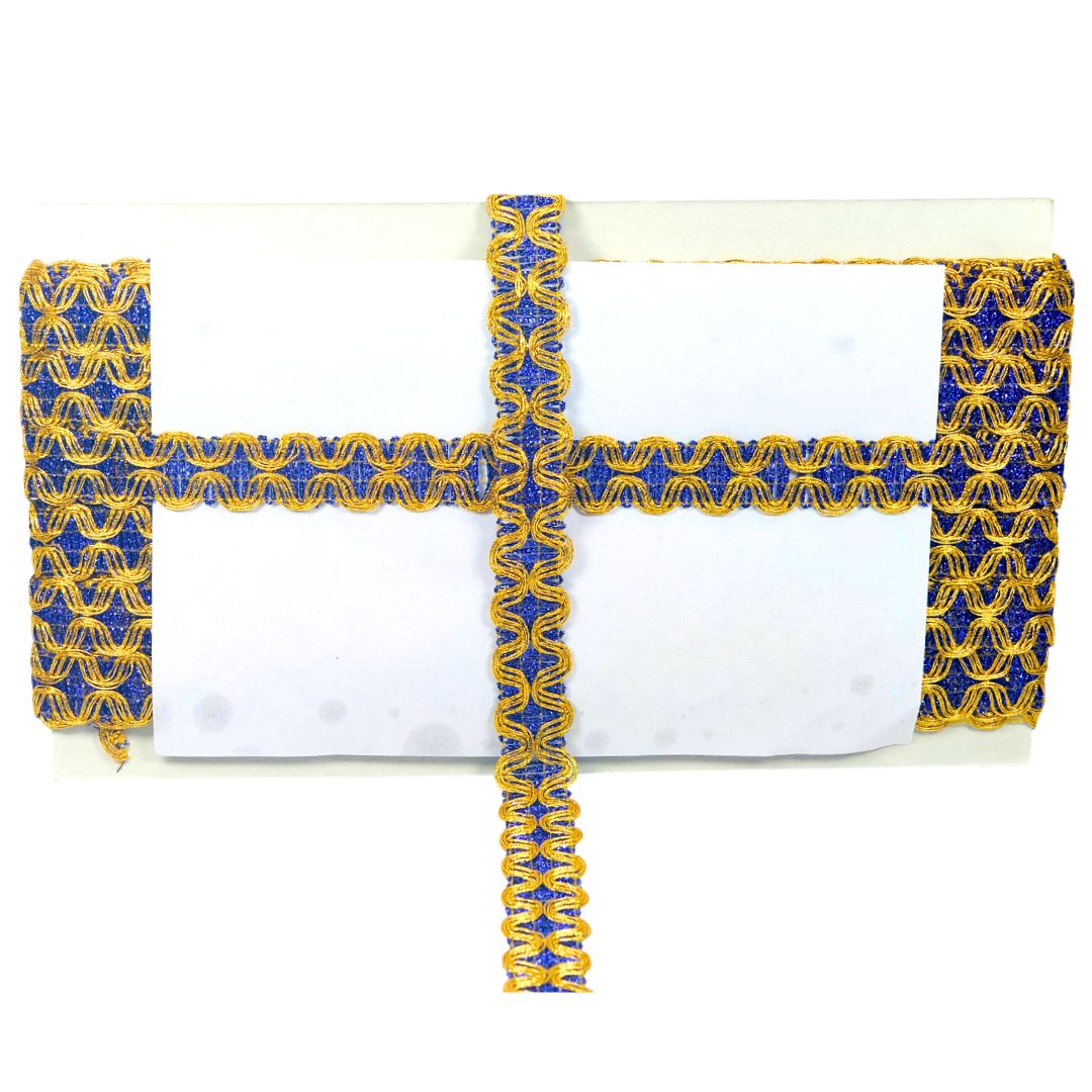 White fabric with blue and yellow geometric patterns on a white background