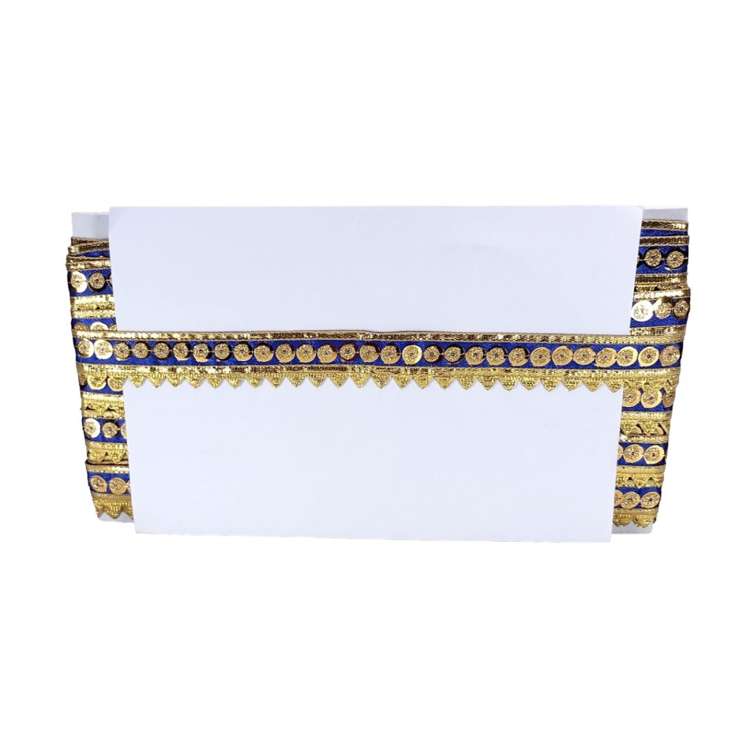 White tablecloth with gold and blue decorative trim on a white background
